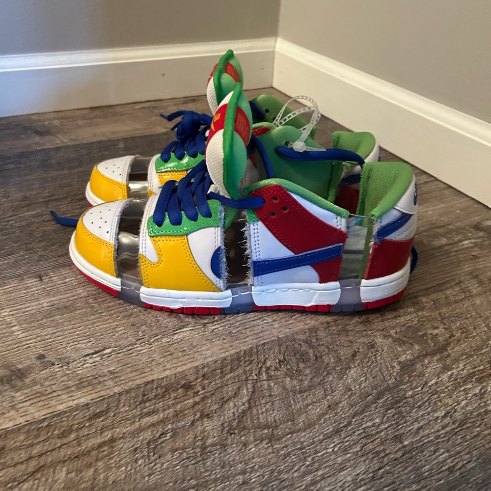Nike Kids Sneakers in Red, Blue, Yellow, and Green